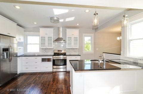 fresh painted kitchen and tiled backsplash